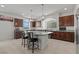 Modern kitchen with granite countertops, a large island, and stainless steel appliances at 9742 Toad Hollow St, Las Vegas, NV 89141