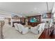 Elegant living room with ornate furniture, decor, and large entertainment center at 9742 Toad Hollow St, Las Vegas, NV 89141