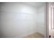 Walk-in closet with wire shelving and wood-style flooring at 9817 Kernville Dr, Las Vegas, NV 89134