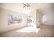 Bright, open-concept living room with hardwood floors and lots of natural light at 9817 Kernville Dr, Las Vegas, NV 89134