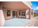 Covered patio with multiple sliding glass doors offering seamless indoor-outdoor living at 9817 Kernville Dr, Las Vegas, NV 89134