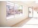 Sunroom features lots of natural light, wood floors, neutral walls and backyard views at 9817 Kernville Dr, Las Vegas, NV 89134