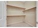 Walk-in closet with multiple shelves for optimal storage and organization at 100 Woolman Rink Ave, Las Vegas, NV 89123