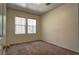 Bedroom featuring neutral walls, carpet floors, and one window with blinds at 1000 Duckhorn Ct # 102, Las Vegas, NV 89144