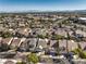 An aerial view of a well-maintained community showcasing the residences and community pool at 10205 Birch Bluff Ln, Las Vegas, NV 89145