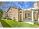This backyard features artificial grass, providing a low-maintenance and green space for outdoor enjoyment at 10205 Birch Bluff Ln, Las Vegas, NV 89145
