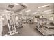 A well-equipped fitness center with treadmills, stationary bikes, and weight machines for residents' use at 10205 Birch Bluff Ln, Las Vegas, NV 89145