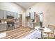 Eat-in kitchen with stainless steel appliances, gray cabinets, and modern countertops at 10205 Birch Bluff Ln, Las Vegas, NV 89145