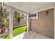 This covered patio overlooks a well-manicured yard and provides shade and privacy at 10205 Birch Bluff Ln, Las Vegas, NV 89145