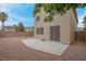 A low maintenance backyard with gravel landscaping, a concrete patio, and block wall at 10630 Lunar Crest Ave, Las Vegas, NV 89129