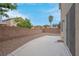 Low maintenance backyard featuring gravel landscaping and concrete patio at 10630 Lunar Crest Ave, Las Vegas, NV 89129