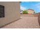Low maintenance backyard featuring gravel landscaping and block wall at 10630 Lunar Crest Ave, Las Vegas, NV 89129