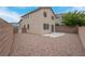 Spacious, low maintenance backyard with gravel landscaping and block wall at 10630 Lunar Crest Ave, Las Vegas, NV 89129
