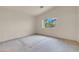 Empty bedroom featuring natural light and carpeted floors at 10630 Lunar Crest Ave, Las Vegas, NV 89129