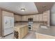 Well-appointed kitchen featuring ample cabinet space, stainless steel appliances, and center island at 1066 Aspen Valley Ave, Las Vegas, NV 89123