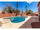 Backyard pool and spa area with comfortable lounge, lush landscaping and a sunny backyard at 1066 Aspen Valley Ave, Las Vegas, NV 89123