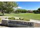 Welcome to Ridgebrook Park! Green space with lush grass, mature trees, and walking paths for relaxation and recreation at 11074 Caramel Crest Ct, Las Vegas, NV 89135