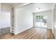 Bonus room featuring sliding glass doors and luxury vinyl plank flooring at 1116 E Owens Ave, North Las Vegas, NV 89030