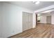 Spacious bonus room featuring luxury vinyl plank flooring and ample storage at 1116 E Owens Ave, North Las Vegas, NV 89030