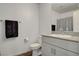 Bright bathroom featuring granite countertop, towel rack, and modern fixtures at 12107 Frost Lime Rd # 1, Las Vegas, NV 89183