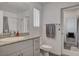 Bright bathroom featuring granite countertop, towel rack, and modern fixtures at 12107 Frost Lime Rd # 1, Las Vegas, NV 89183