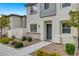 Inviting front of home with low-maintenance landscaping, a walkway, and clean, contemporary design elements at 12107 Frost Lime Rd # 1, Las Vegas, NV 89183
