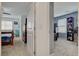 Bedroom views from hallway offers easy access and highlights the well-organized and comfortable living spaces at 12107 Frost Lime Rd # 1, Las Vegas, NV 89183
