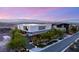 Modern home with mountain views showcasing professional landscaping and lighting at 13 Rockstream Dr, Henderson, NV 89012