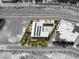 Aerial view showcasing modern home design, pool, solar panels, landscaping, and surrounding neighborhood at 13 Rockstream Dr, Henderson, NV 89012