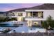 Modern home with backyard pool, firepit, and city view at 13 Rockstream Dr, Henderson, NV 89012
