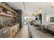 Contemporary bar area featuring stone countertops and stainless steel appliances at 13 Rockstream Dr, Henderson, NV 89012