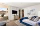 Contemporary bedroom with a walk-out deck, modern furniture, and designer decor at 13 Rockstream Dr, Henderson, NV 89012
