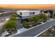 Contemporary two-story home with clean lines, desert landscaping, and mountain views at 13 Rockstream Dr, Henderson, NV 89012