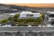 Modern home exterior with sleek architectural design, meticulous landscaping, and private driveway at 13 Rockstream Dr, Henderson, NV 89012