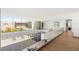 Bright foyer with glass railings and stunning views to the outdoor space at 13 Rockstream Dr, Henderson, NV 89012