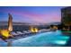 Relax by the infinity pool with breathtaking views of the Las Vegas skyline at 13 Rockstream Dr, Henderson, NV 89012