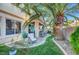 Charming backyard patio with comfortable seating, ideal for enjoying the serene outdoor space at 1353 Volturno Way, Henderson, NV 89052
