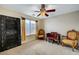 Comfortable bedroom showcasing ornate decorations, warm colors and a ceiling fan at 1353 Volturno Way, Henderson, NV 89052