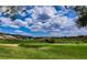 Scenic golf course view with rolling green hills and a sand trap, perfect for a day on the links at 1353 Volturno Way, Henderson, NV 89052