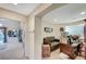 Hallway featuring an office area, neutral colored walls, and ample space at 1353 Volturno Way, Henderson, NV 89052