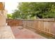 Fenced backyard with brick-paver patio offers a private outdoor living space and natural light at 1467 Hialeah Dr # C, Las Vegas, NV 89119