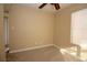 Bright, carpeted bedroom, with blinds on the windows offering filtered light and privacy at 1467 Hialeah Dr # C, Las Vegas, NV 89119