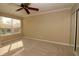 Cozy bedroom with a ceiling fan and closet at 1467 Hialeah Dr # C, Las Vegas, NV 89119