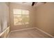 Inviting carpeted bedroom with a window and blinds at 1467 Hialeah Dr # C, Las Vegas, NV 89119