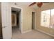 Cozy carpeted bedroom with a ceiling fan, window and closet at 1467 Hialeah Dr # C, Las Vegas, NV 89119