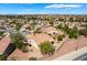 Expansive community view featuring desert landscaping, stucco homes and terra cotta tile roofs at 1781 Cypress Lake Ct, Henderson, NV 89012