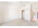 Neutral bedroom with carpet, ceiling fan, and access to kitchen at 1781 Cypress Lake Ct, Henderson, NV 89012