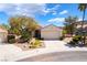 Charming single-story home with a well-manicured front yard and two-car garage at 1781 Cypress Lake Ct, Henderson, NV 89012