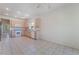 Spacious kitchen featuring tile flooring, light wood cabinets, and white appliances at 1781 Cypress Lake Ct, Henderson, NV 89012