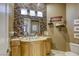 Elegant bathroom featuring mosaic tile accents, stylish vanity, and modern fixtures at 2008 Winter Wind St, Las Vegas, NV 89134